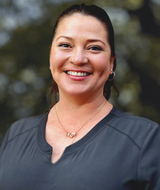 Book an Appointment with Carol Cadle at Omega Massage + Wellness