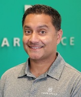 Book an Appointment with Quincy Almeida at CARESPACE Health+Wellness - Weber North